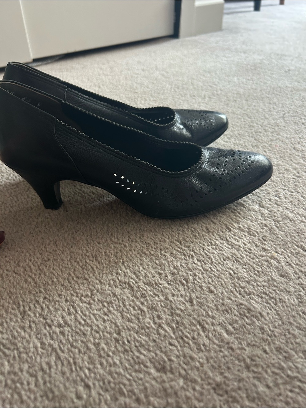 Women's Black Perforated Mid-Heel Pumps